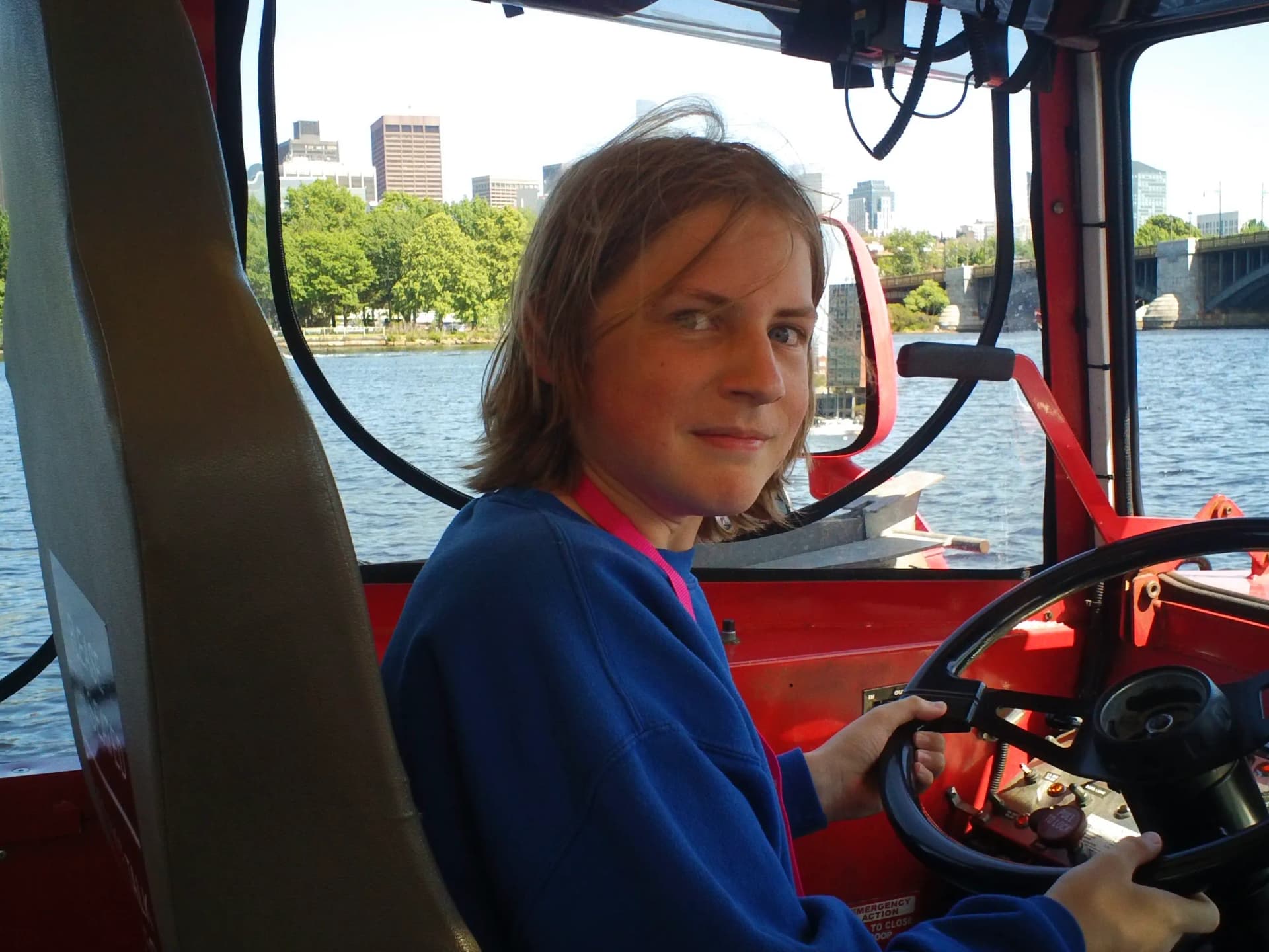 me driving a boat i know im so cool